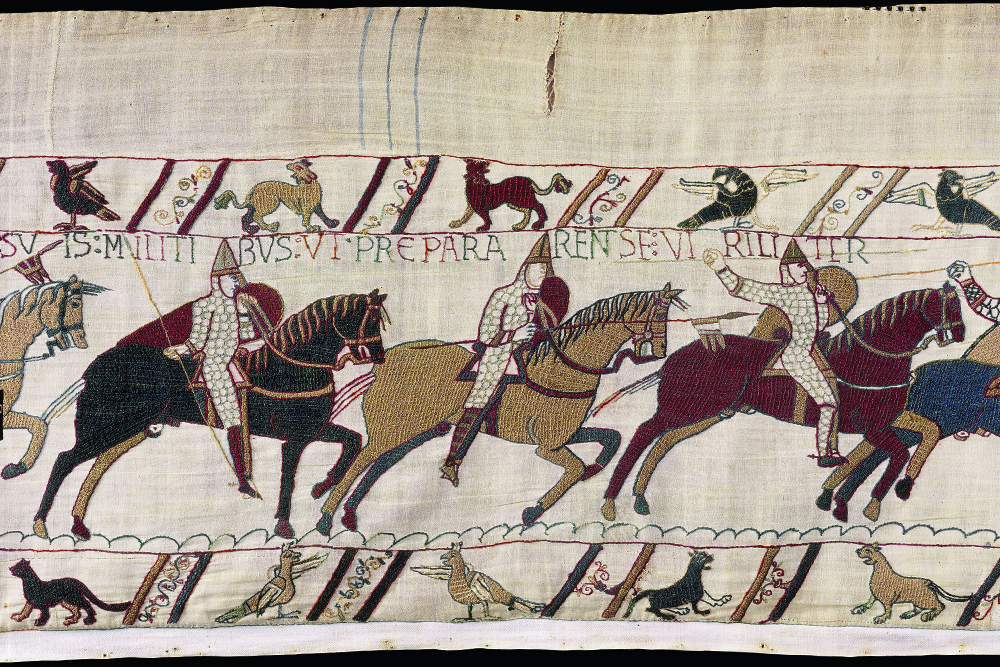 A detail from the Bayeux tapestry depicting knights on horseback.