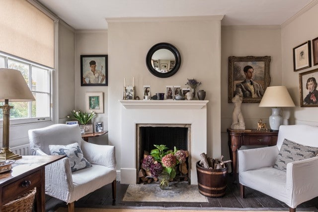 armchairs in front of fireplace in Georgian drawing room