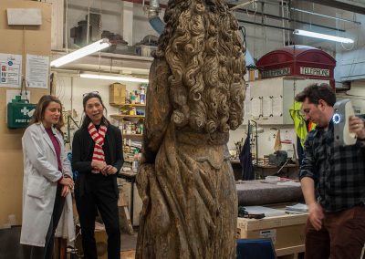 augmented reality scan of 17th century carved wooden statue being supervised by conservator and curator at Plowden & Smith art restoration studio
