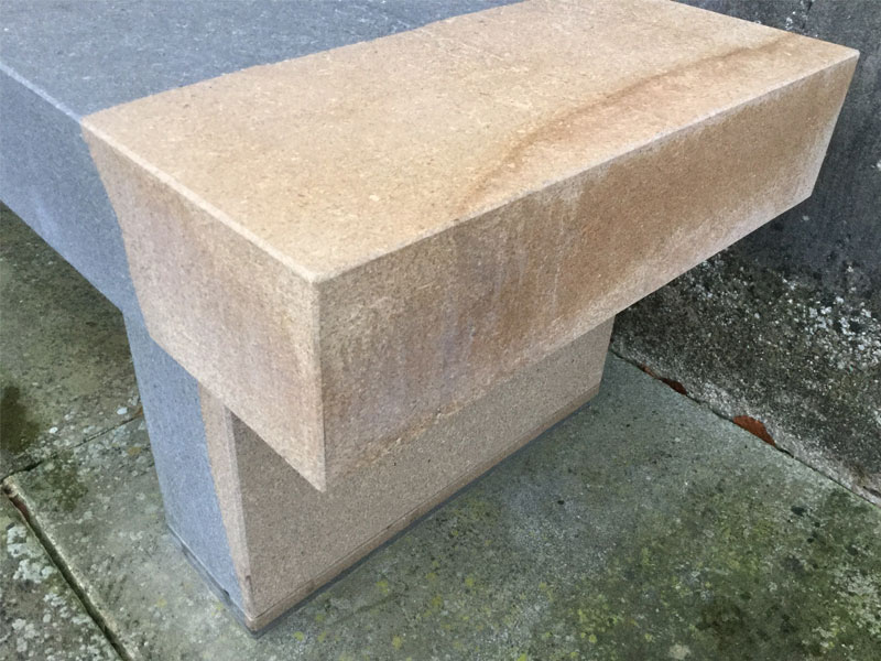 water marks on a stone bench - how to protect outdoor sculpture