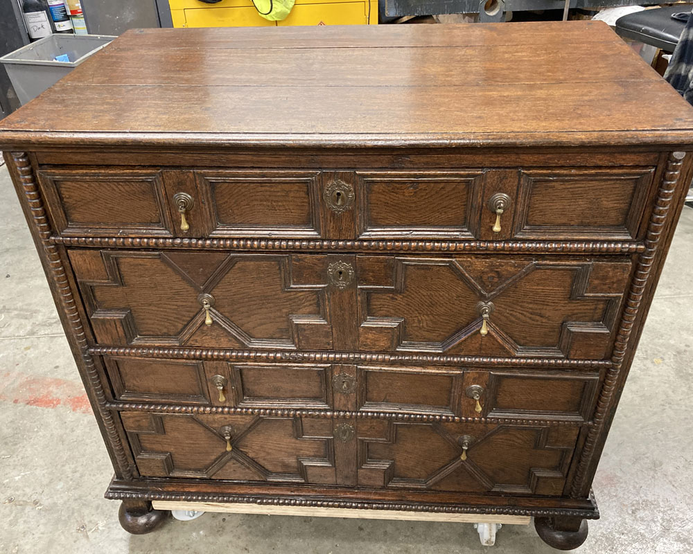 oak jacobean chest of drawers after furniture restoration treatment