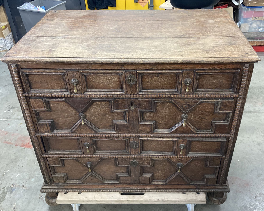 oak jacobean chest of drawers before furniture restoration treatment