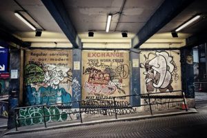 Poland Street Mural covered in graffiti before restoration
