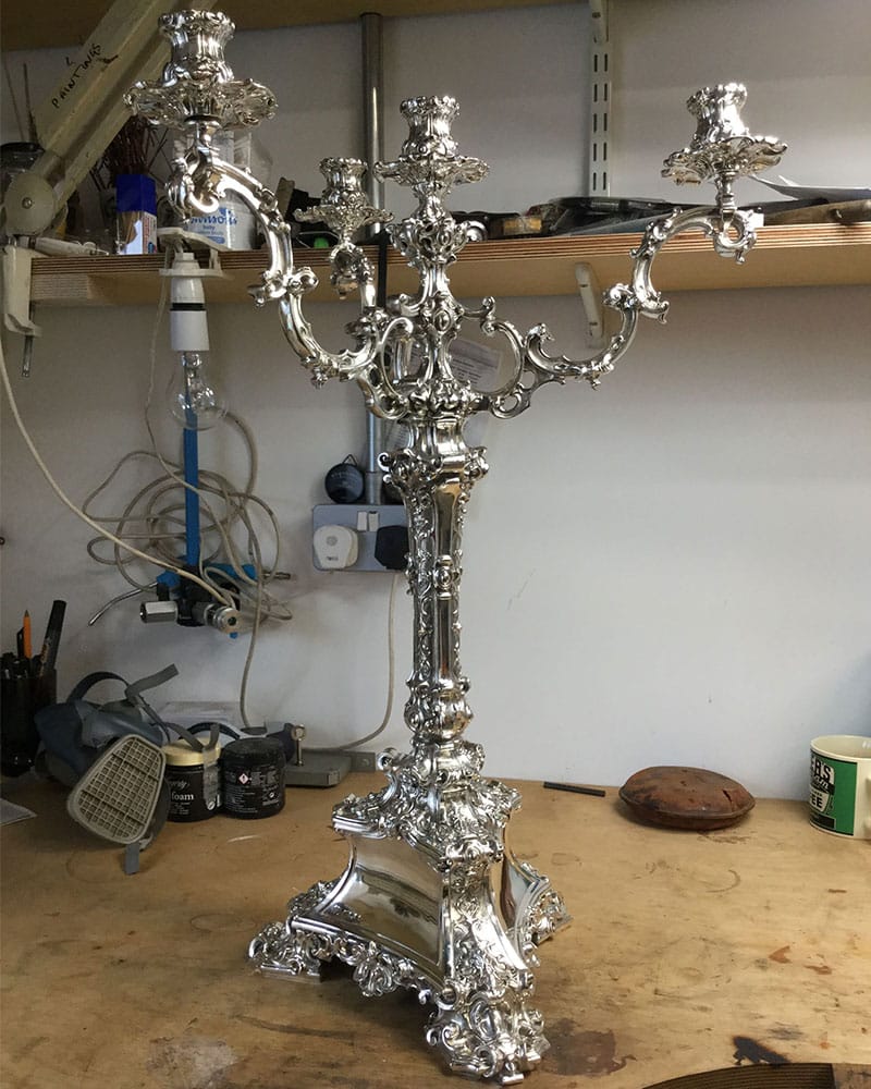 silver candelabrum after silver restoration and silver polishing treatment at Plowden & Smith